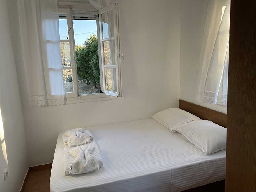 Louisa departement bedroom with a window view to the North